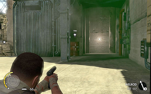 From a safe distance, aim at the explosive barrel - Sniper Elite 3 Afrika: Destroying the first transformer - Sniper Elite 3 Afrika: Mission 8 - Ratte Factory - Sniper Elite III: Afrika Game Guide