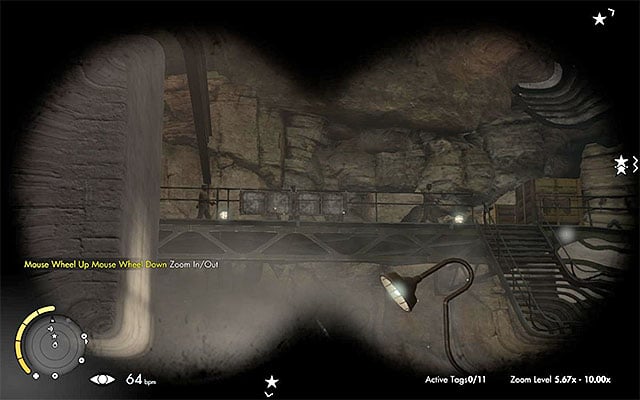 Watch out for the enemies on the balconies above - Sniper Elite 3 Afrika: Exploring the tank hall - Sniper Elite 3 Afrika: Mission 8 - Ratte Factory - Sniper Elite III: Afrika Game Guide