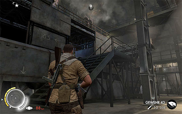 The stairs that allow you to mount the tank - Sniper Elite 3 Afrika: Planting an explosive on the tank - Sniper Elite 3 Afrika: Mission 8 - Ratte Factory - Sniper Elite III: Afrika Game Guide