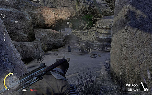 A narrow passage, requiring you to lie on the ground. - Sniper Elite 3 Afrika: Eliminating the second enemy officer - Sniper Elite 3 Afrika: Mission 2 - Gaberoun - Sniper Elite III: Afrika Game Guide