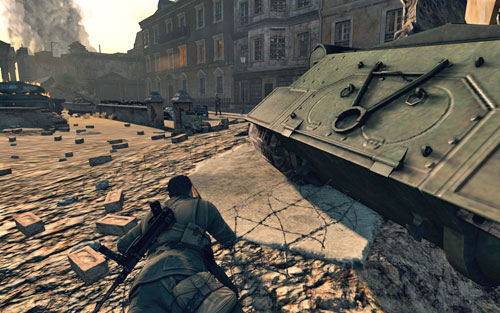 Crawl further to the right - try not to get too far onto the small debris pile by the tank, as you will get noticed - Mission 10 - Brandenburg Gate - p. 2 - Walkthrough - Sniper Elite V2 Game Guide & Walkthrough