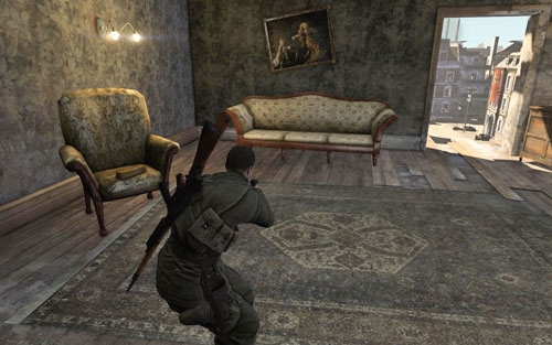 The gold is on a chair in the room on the left, at the very top of the building [#9] which you will enter after planting the charges - Mission 1 | Wine Bottles and Gold Bars - Wine Bottles and Gold Bars - Sniper Elite V2 Game Guide & Walkthrough