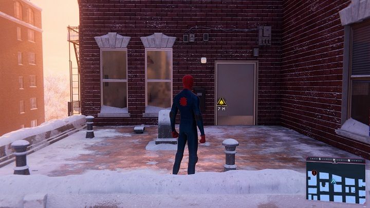 Go to the designated location and use the door to enter the roof of the building - Spider-Man Miles Morales: Reconnecting walkthrough - Main missions - Spider-Man Miles Morales Guide