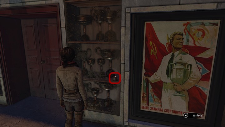 In the room that you enter, look at the display case - right next to the door - Find three Yukol lenses - Chapter seven - Syberia 3 Game Guide
