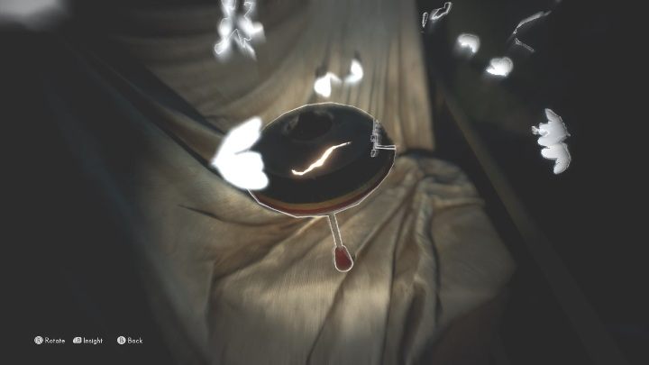 This echo is found on a spinning toy, lying on a pile of items covered with cloth - The Medium: Echoes - list - Secrets and Collectibles - The Medium Guide