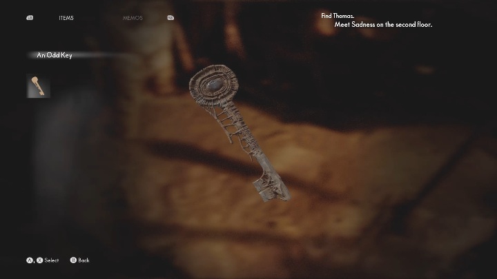 The strange key is on the small table on the right side of the room - The Medium: Encounter with Sadness - walkthrough - Walkthrough - The Medium Guide