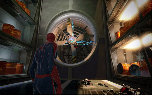 The further road leads behind two big turbines - Chapter 06 - Smythe Strikes Back - p. 1 - Walkthrough - The Amazing Spider-Man - Game Guide and Walkthrough