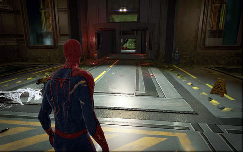 After you reach a room with a big tank in the middle, jump to the door on the right - Chapter 06 - Smythe Strikes Back - p. 2 - Walkthrough - The Amazing Spider-Man - Game Guide and Walkthrough