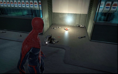 Defeat the robots there and pick up the manual lying on the left - Chapter 07 - Spidey to the Rescue - p. 1 - Collectibles inside buildings - The Amazing Spider-Man - Game Guide and Walkthrough