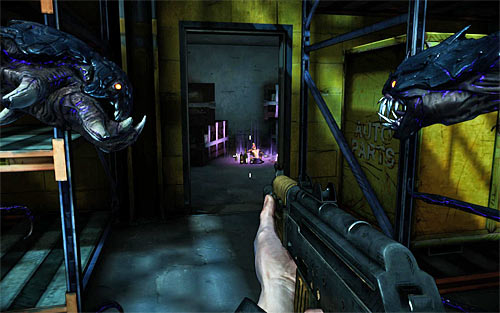 Stay in the hall where you fought your last battle and look around for a narrow passage shown on a screen above - Q and A - p. 3 - Walkthrough - The Darkness II - Game Guide and Walkthrough