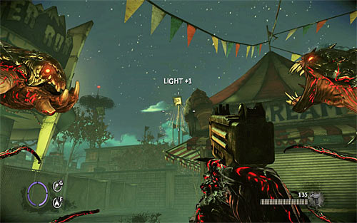 Move few steps forwards, noticing that there are enemies in the carnival now - Fun and Games - p. 1 - Walkthrough - The Darkness II - Game Guide and Walkthrough