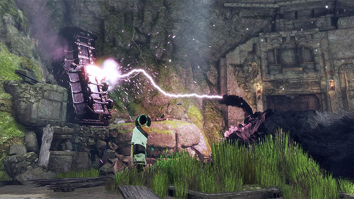 Use the mirror to aim at the wagons shown on the screenshot and make them move once they are hit by a lightning - Help Trico during the fight and save him from dying | Walkthrough - Walkthrough - The Last Guardian Game Guide