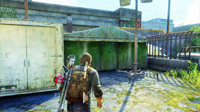 While on the platform, search for a small green tent - The Last of Us: Bus Depot, Artifacts and pendants - Artifacts and pendants - The Last of Us Guide