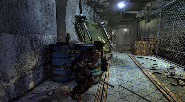 Carefully approach the corridor occupied by two bandits - Discover the Ancient Tomb | 23: Storm Chaser Walkthrough - 23: Storm Chaser | Walkthrough - Tomb Raider Game Guide