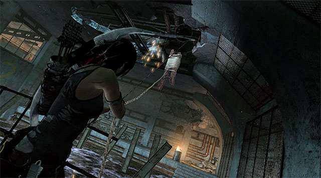 Stop near the discharge, look up and shoot a rope arrow at the indicated spot - The Flooded Vault | Optional Tombs: Shipwreck Beach - Shipwreck Beach | Optional Tombs - Tomb Raider Game Guide
