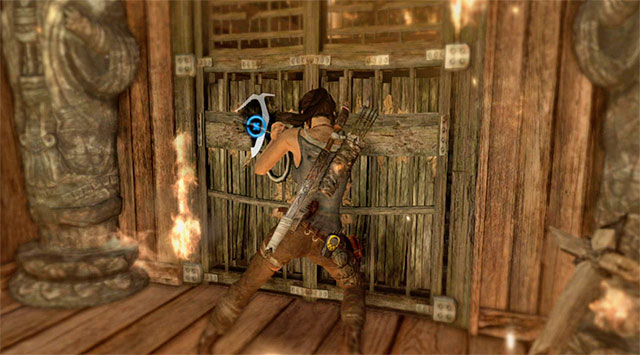 Move forward and use the climbing axe to unlock the door - Find Sam | 17: Into the Fire Walkthrough - 17: Into the Fire | Walkthrough - Tomb Raider Game Guide