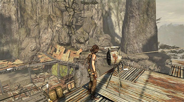 Destroy the Alarm siren with the axe (reward: 10 XP) - Silencer | Collectibles: Shantytown - Collectibles: Shantytown - Tomb Raider Game Guide