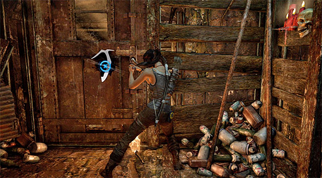 Go back to the main area of the bunker and use the newly acquired pry axe on the north-east door, pictured above (rapidly tap the action button); this will unlock a passage to the other side of the forest - Exit the Bunker | 5: Just Keep Moving Walkthrough - 5: Just Keep Moving | Walkthrough - Tomb Raider Game Guide