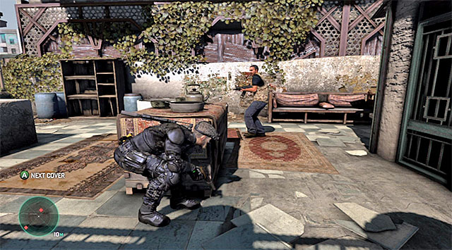 Take a few steps ahead and take cover behind the wall shown in the screenshot - Reach the vicinity of the police station - Mission 1 - Safehouse - Tom Clancys Splinter Cell: Blacklist - Game Guide and Walkthrough