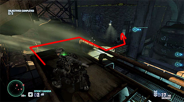 Eventually, you should make it to the dimly-lit area show in the screenshot where, apart from a single enemy, you also need to watch out for a security camera - Mission 3 - Hackers Den - Optional missions assigned by Grim - Tom Clancys Splinter Cell: Blacklist - Game Guide and Walkthrough