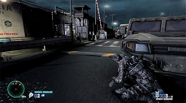 The Hummer serves well as a cover - Make it out of the camp - Mission 8 - Detention Facility - Tom Clancys Splinter Cell: Blacklist - Game Guide and Walkthrough