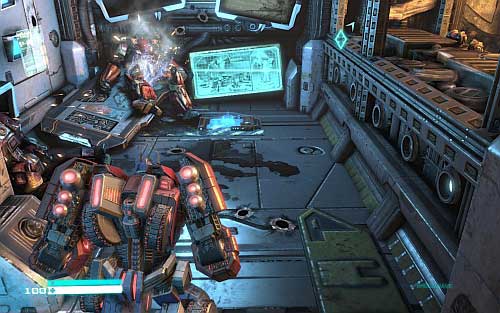 During exploration of the base you will get to the room with destroyed table and killed robots - Chapter 2 | Blueprints - Blueprints - Transformers: Fall of Cybertron Game Guide & Walkthrough