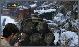 Jump on the wagon with the truck to trigger a short cut-scene - Uncharted 2: Tunnel Vision, chapter 14 walkthrough - Walkthrough - Uncharted 2 Guide