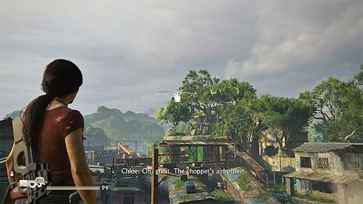 The chopper keeps circling above the station - avoid staying out in the open, because you can be spotted by its crew - Destroy the enemy chopper - Walkthrough - Uncharted: The Lost Legacy Game Guide