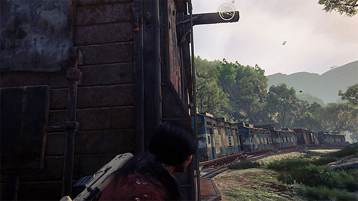 Some of the wagons allow you to use your grappling hook - End of the Line - Walkthrough - Uncharted: The Lost Legacy Game Guide