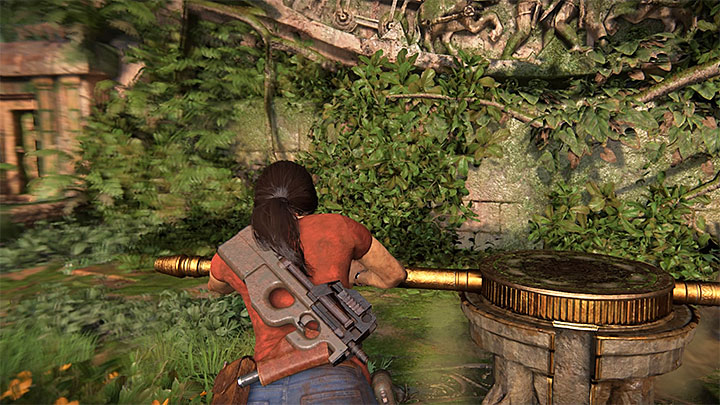 Use the rotating mechanism to unlock the gate - - Leaving Western Ghats - Walkthrough - Uncharted: The Lost Legacy Game Guide