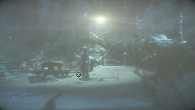 A Totem hidden next to the camp table - Until Dawn: Clues and totems in Episode 6 - Clues and totems - locations - Until Dawn Game Guide & Walkthrough