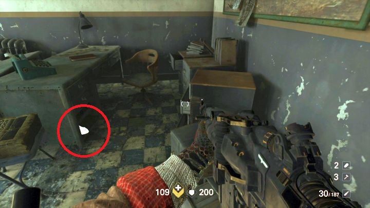 Gold #6 under the desk at the police station. - Downtown collectibles, gold and secrets | Wolfenstein II secrets - Chapter 2 - Manhattan - Wolfenstein II: The New Colossus Game Guide
