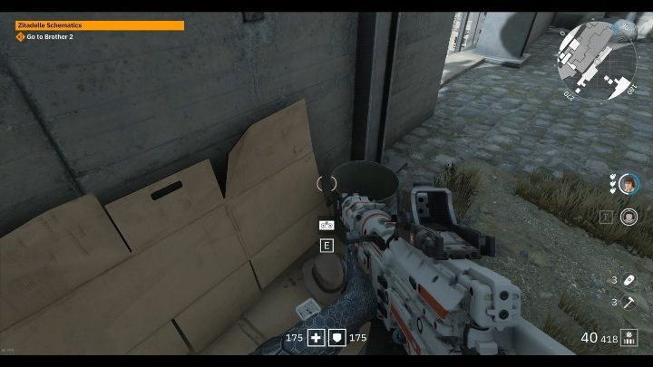 The white tape is on the ground, on a pile of boxes - Secrets and collectibles in Detention Area | Wolfenstein Youngblood - Collectibles and secrets - Wolfenstein Youngblood Guide