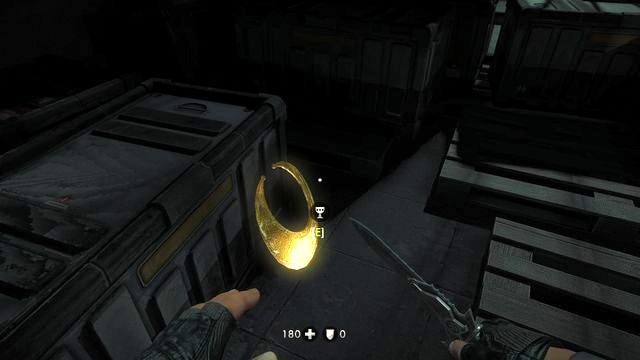 Gold next to a stack of crates - The Underground Berlin - Secrets - Wolfenstein: The New Order - Game Guide and Walkthrough