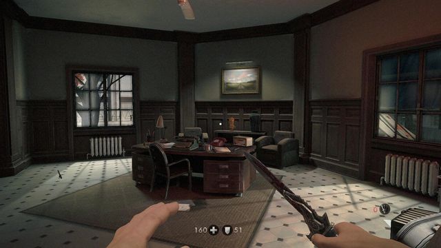 As on the screenshot, behind the desk - Belics Camp - Secrets - Wolfenstein: The New Order - Game Guide and Walkthrough